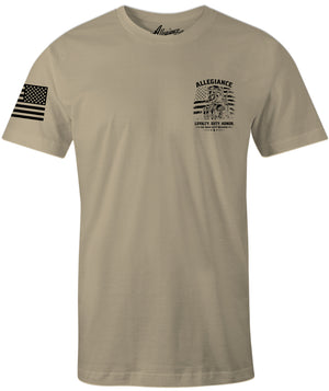 No Man Left Premium Tee sand with small front chest print and American flag sleeve